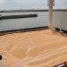 Workers assist the loading of corn on to a ship at Pier 80 in the Black Sea port of Constanta, Romania on May 3, 2022. - The Romanian port seeks to become an export hub for neighbouring Ukraine after Russia's invasion cut off its sea routes. Before the war, Ukraine exported 4.5 million tonnes of agricultural produce per month through its ports -– 12 percent of the world's wheat, 15 percent of its corn and 50 percent of its sunflower oil. (Photo by Daniel MIHAILESCU / AFP)